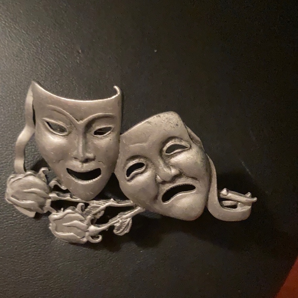 J J brooch theater piece